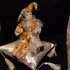 Gold and Silver Jester Doll on Pillow